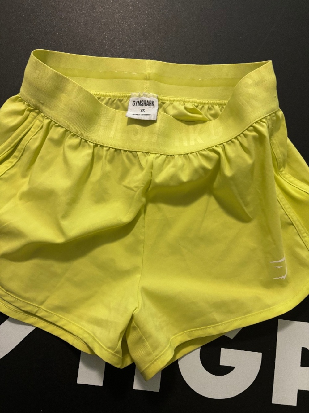 Gymshark yellow running shorts